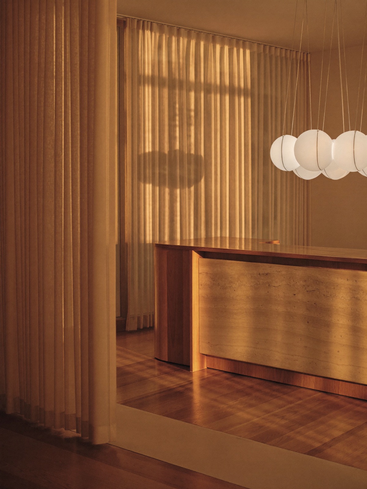 Warm, minimal aesthetic clinic reception